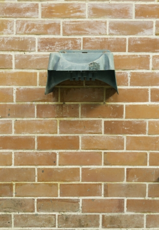 Hose hanger on the wallの写真素材