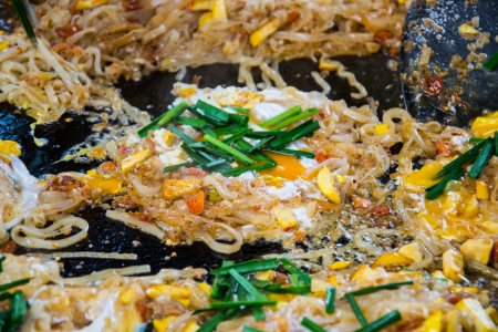 Fire noodles with egg and shrimp on pan ( Thailand call pad thaiの写真素材