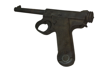 An antique revolver isolated on whiteの写真素材