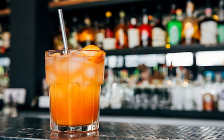 Beverages at the bar orange drink in the glassの素材