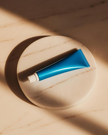 a blue toothbrush on a marble surfaceの素材