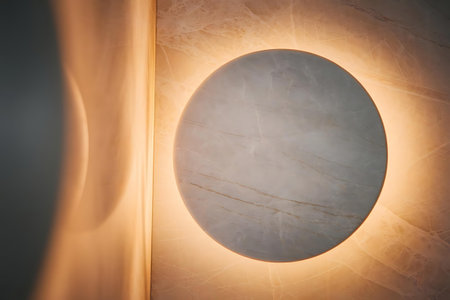 a round light fixture on a wallの素材