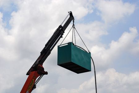 crane lift up a metal container