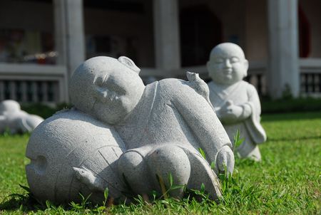 stone sculpture in the temple gardensの写真素材
