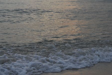 sunset and sea waves at the beach 