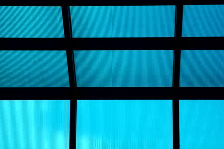 blue glass shelter inside the schoolの写真素材