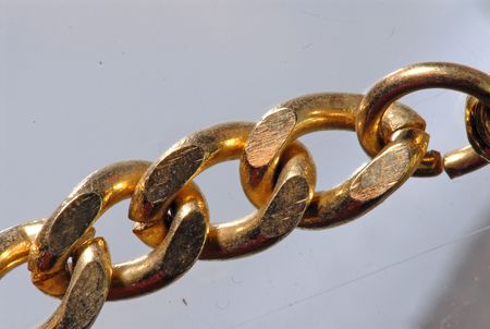 gold chains on the table の写真素材