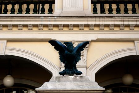 sculpture infront of the old building の写真素材