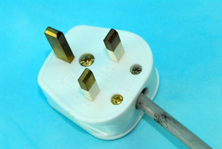 3-pin plug on the table の写真素材