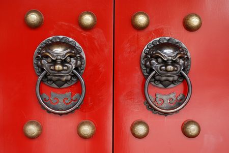 brass lion head of the chinese templeの写真素材