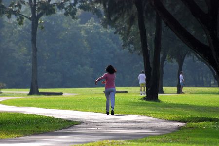 woman doing exercise in the parksの写真素材