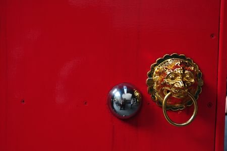 lion head and red doorの写真素材
