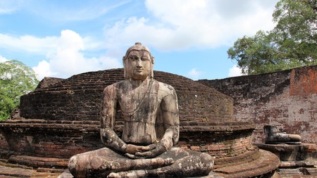 Sitting Buddha On Old Templeの写真素材