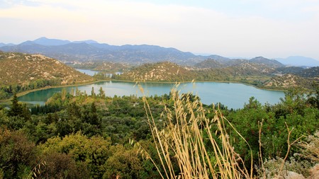 Natural lake green mountain the valley of life full of fruits and vegetables in Croatiaの写真素材