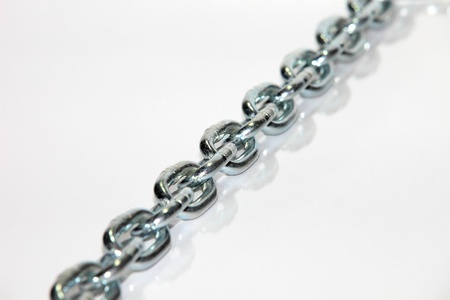 chain macro on cold brushed metal, heavy duty chain with limited dof and copypace 