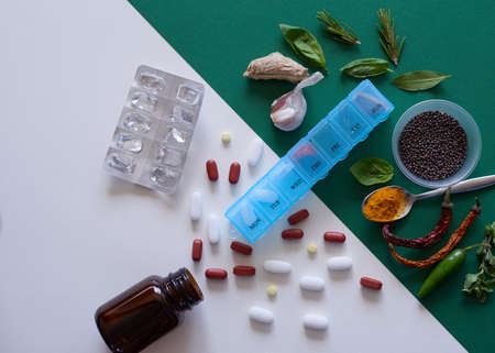 Herbal versus chemical medicine - alternative remedies flat lay comparisonの写真素材