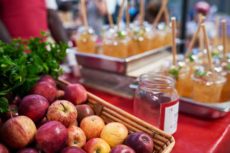 A food stall selling apple iced tea at a marketの写真素材