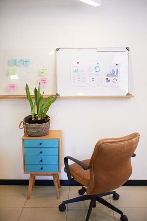 An office scene of whiteboard presentation with no-oneの写真素材