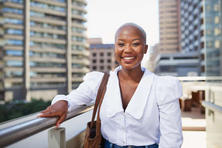 Portrait of a young Black woman working in the cityの写真素材