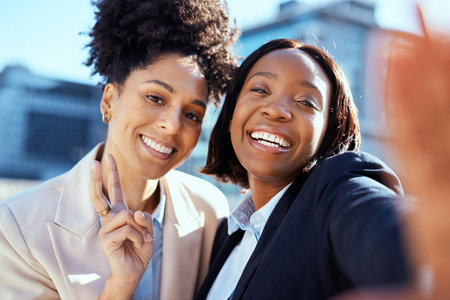Diverse Professional Women Taking Selfie in Urban Environment, Smiling and Happy Moments