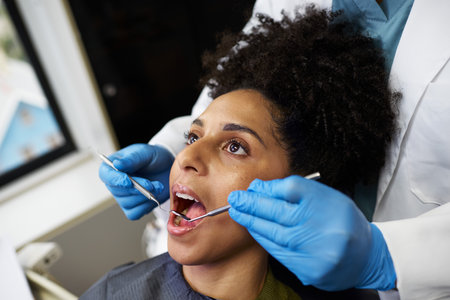 Dentist Performing Routine Dental Exam with Precision and Care
