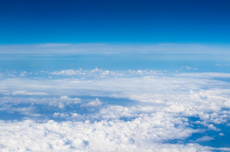 blue sky high view from airplane clouds shapesの写真素材