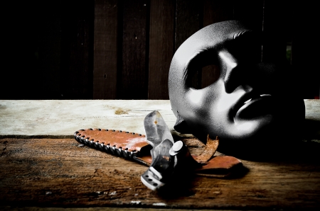 Mask with knife の写真素材