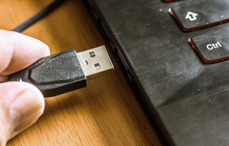 hand hold  USB cable.の写真素材