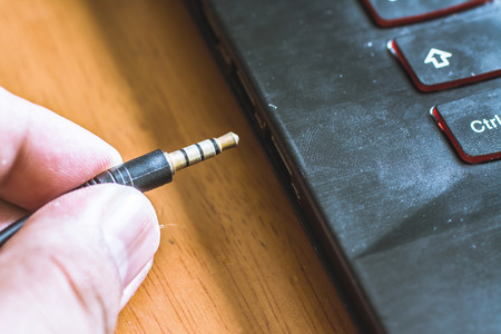 hand hold a earphone  jackの写真素材