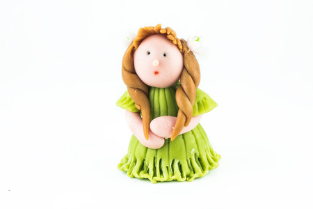 sculpture dolls on white backgroundの写真素材