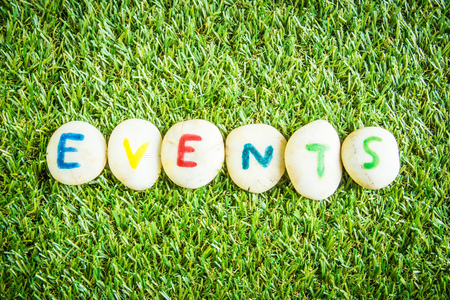 events paint on stone , on the grassの写真素材