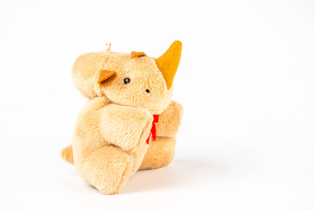 Rhinoceros doll on white backgroundの写真素材
