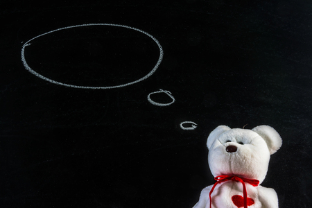 teddy bear with blackboard , backgroundの写真素材