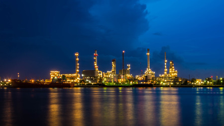 Oil refinery at twilight , Chao Phraya river, Thailand