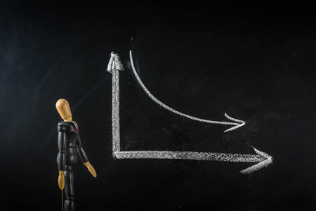 Wood Figure business man with graph symbol  ,black ground black broadの写真素材