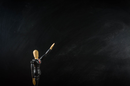 Wood Figure business man  ,black ground black broadの写真素材