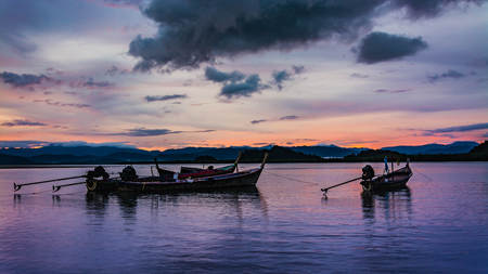 fishing boat  at sunset .Thailandの写真素材