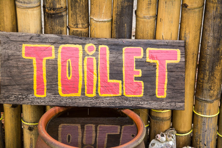 old toilet sign , woodの写真素材