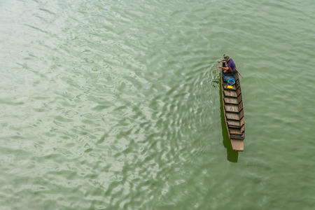 man on the small boatの写真素材