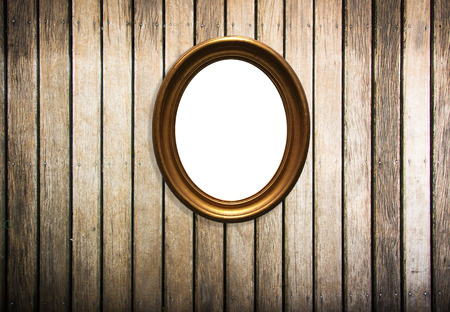 wooden picture frame on old wood  backgroundの写真素材