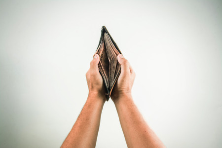 wallet in hand on white background .