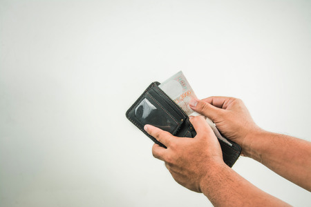 wallet in hand on white background .