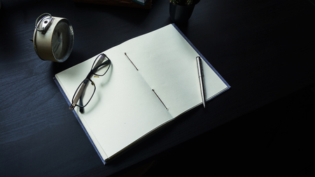 Notebook on the desk , Empty space on the notebook for Enter text or image .の写真素材