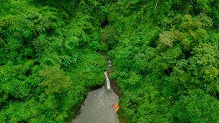 Waterfall in the middle of the forest. Bird eye view , droneの写真素材