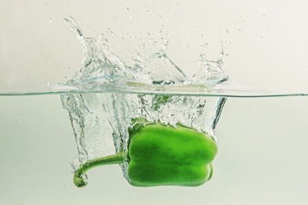 Bell pepper  falls in waterの写真素材