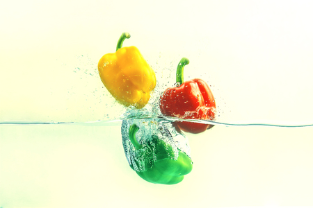 Bell pepper  falls in water .の写真素材