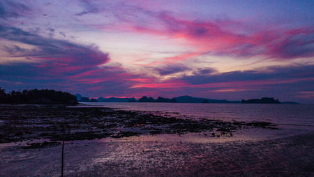 landscape of sunset and fishing boat .の写真素材