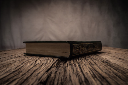 Koran - holy book of Muslims ( public item of all muslims ) on the table , still life  .の写真素材