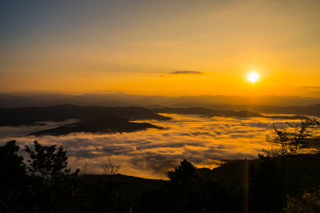 sunset overlooking mountains with Mist .の写真素材