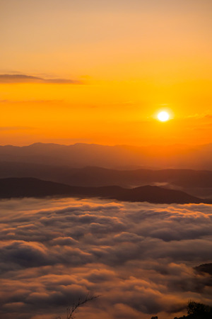sunset overlooking mountains with Mist .の写真素材